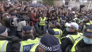 UK Police attack COVID protest